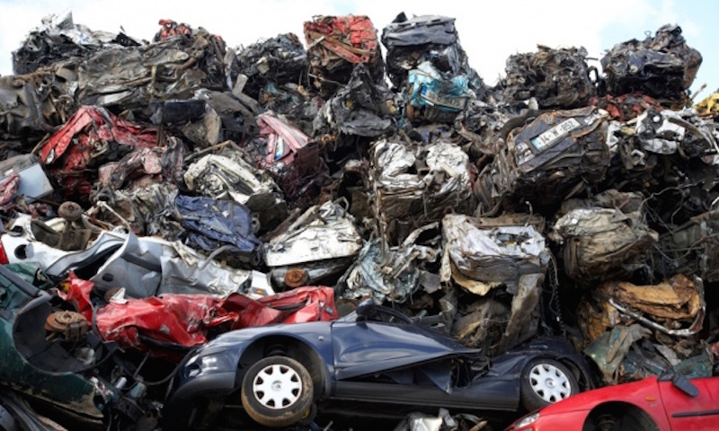  Piles of crushed cars at a metal recycling site in Belfast, Northern Ireland. Photograph: Alamy