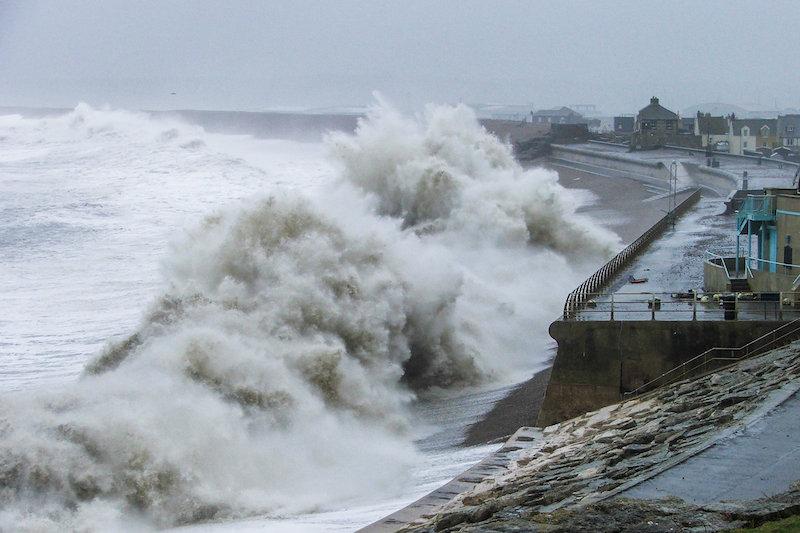 Waves crashing onto Chesil Beach in Dorset during the winter of 2013/14. Credit: Tim Poate/University of Plymouth